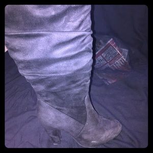 Black knee High boots.